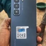 A phone user with an Infinix HOT 50 (Image credit: infinixmob.com)
