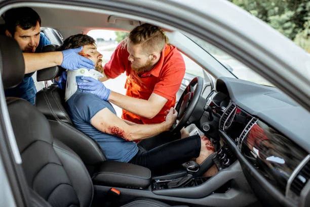 Car accident victim receiving treatment