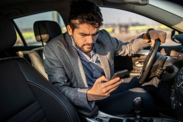 A driver texting and driving in Texas