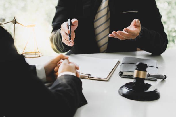A truck accident attorney and a client