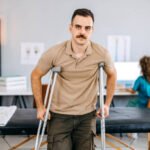 A Truck Accident Victim on crutches