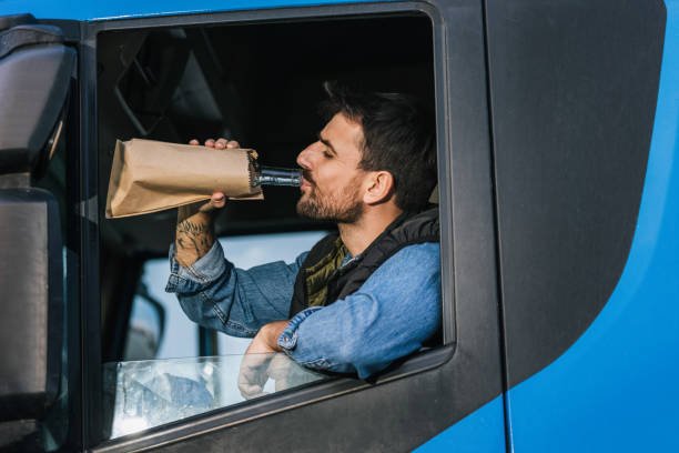 A truck Driver Drinking Alcohol on Duty