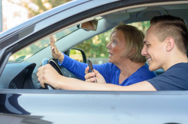 A Young Man Texting While Driving