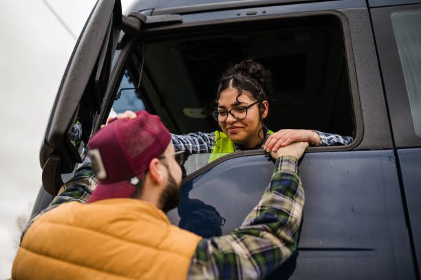 Two Young Couples Driving their Truck together